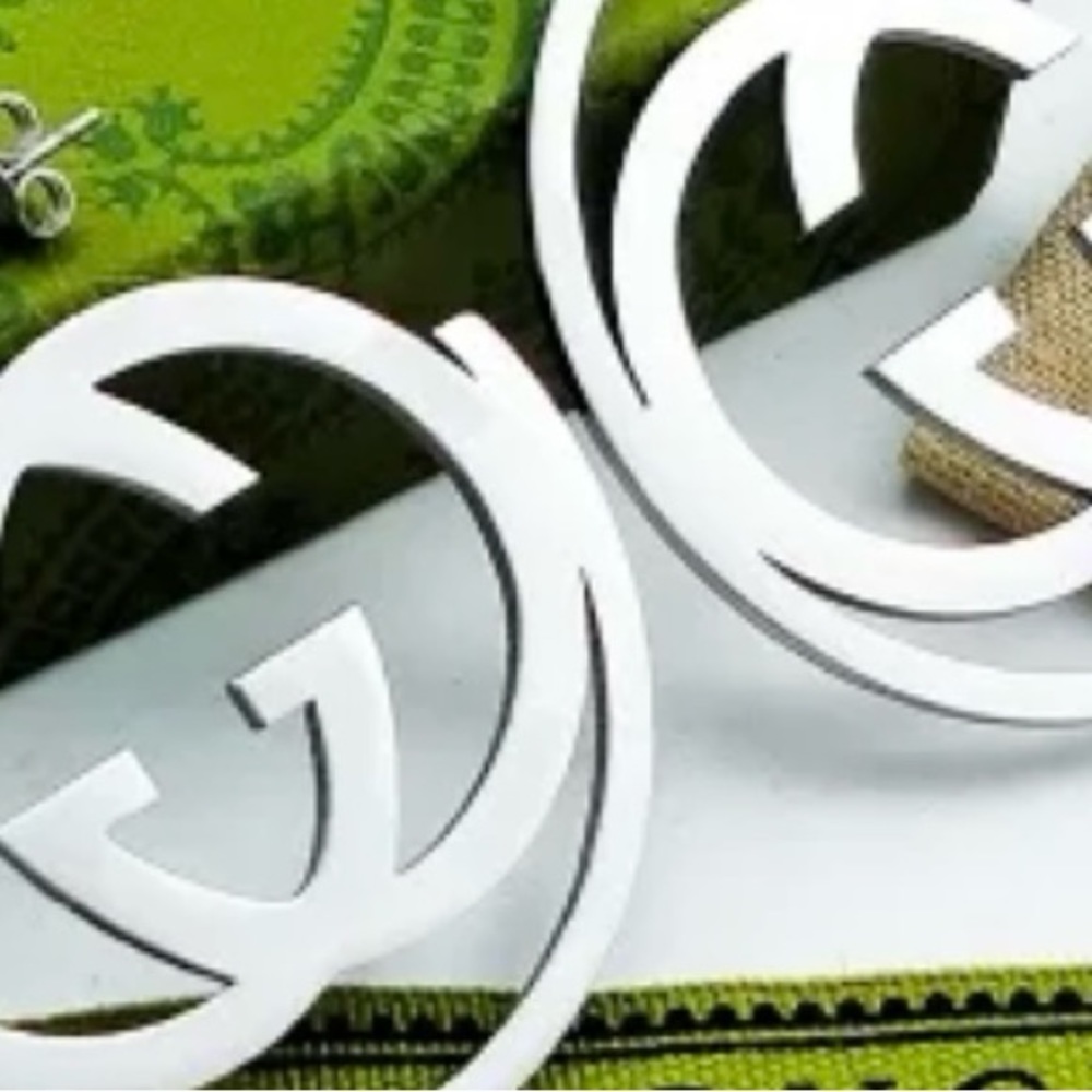 Beautiful designer inspired stainless steel silver hoop earrings